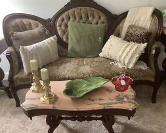 One of the two Victorian sofas with tufted back in lovely colors.