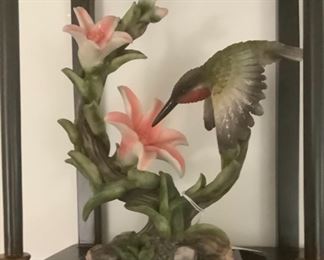 Close-Up of one of the humming bird figurines.