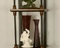 Beautiful wall hanging with hummingbird figurines.