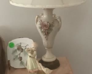 One of the pink marble top tables with the beautiful lamp.