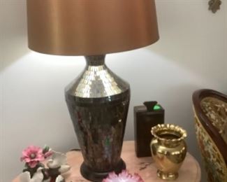 The beautiful lamp with brown shade and cut colored lamp base in different colors of colored glass.