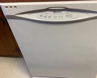 The dish washer.  It is like new.  Has wood top.