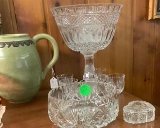 Beautiful punch crystal bowl on pedestal with crystal cups.