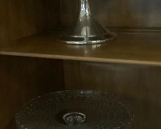 Silver stand a crystal cake plate.