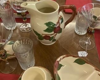 Showing some of the serving pieces of the Apple dishes.