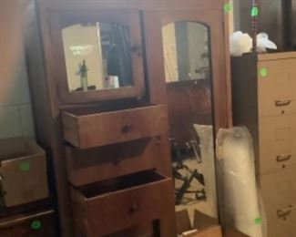 The oak wardrobe in basement.  In excellent condition.