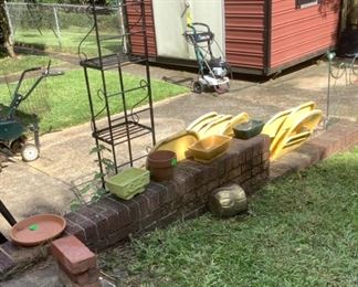 Flower pots, metal chairs, bakers rack.