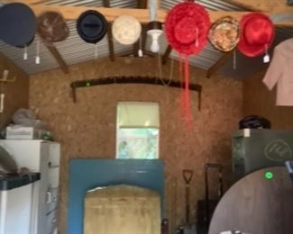 Vintage hats in shed.