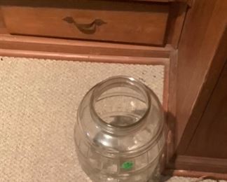 Old pickle jar.  There are also some canning jars in basement.