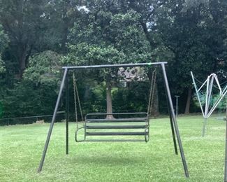 Metal swing with metal stand.  Clothes line also.