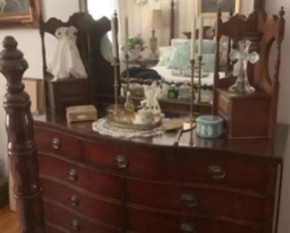 Mahogany dresser with lots of drawers and mirror.  Has glass on top.