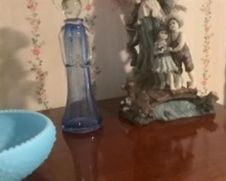 Beautiful blue glass Angel with Angel statue with 2 young children.