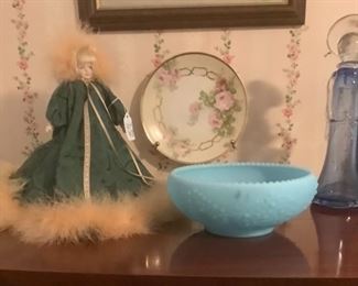Beautiful doll with gown and beautiful blue bowl.