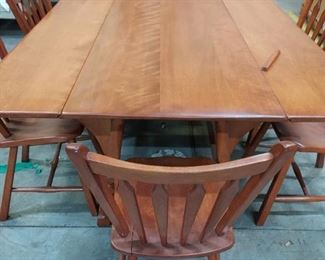 Va. maple table with 6 chairs $200.00