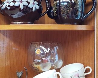 Teapots, china cups