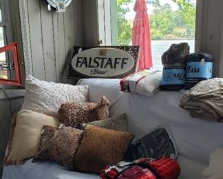 pillows, throws, Beer signs. FYI: The FALSTAFF sign has a crack so being sold AS IS