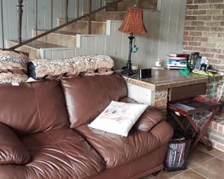 Faux leather love seat, pillows, decor