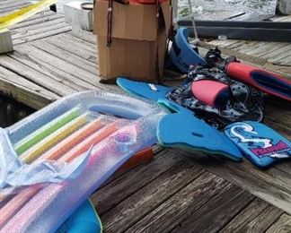 floats, life jackets, skis