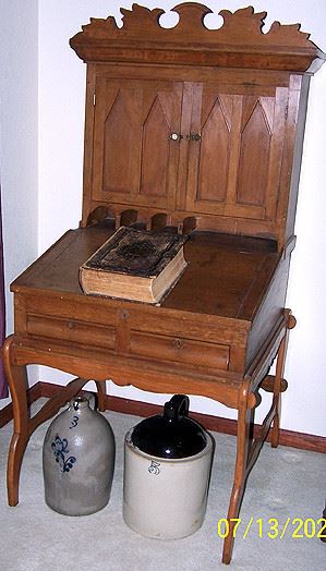 Early desk, 3 gal. jug w/ cobalt flower, two tone jug and early Bible