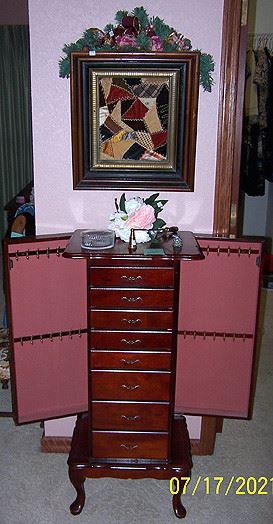 Jewelry armoire, old frame w/ quilt