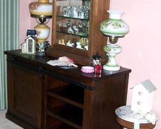 Entertainment center, two GWTW style lamps, table top display cabinet,  etc...