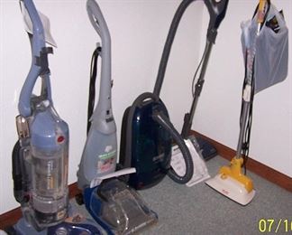 Vacuum, carpet and floor cleaners