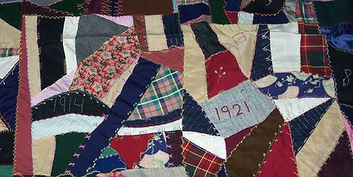 One quilt top started in 1914 and complete in 1921