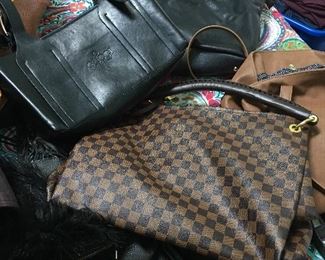 Adolfo! Gucci! Louis Vuitton! Handbags.