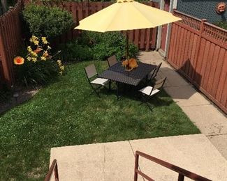 Fold up patio set w/chairs. Garage is FULL.