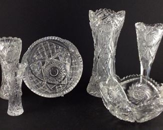 Pictured in back left to right: American brilliant cut crystal 8” Corset vase. American brilliant cut 8 inch crystal bowl. American brilliant cut crystal corset 12” vase. American brilliant cut crystal buzz star variation with sawtooth Scalloped edge 10 1/4” trumpet Pedestal stem vase. Pictured in front: Lenox 6” star crystal vase. American brilliant cut 8 inch crystal bowl.