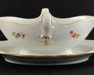 Gravy bowl with attached under plate. ”Scattered flowers” by Meissen (Germany) circa 1820