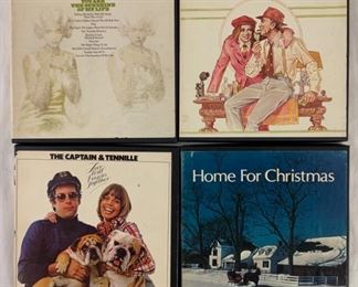 Multiple reel to reel tapes. Shown here: Ray Conniff, you are the sunshine of my life; Percy Faith the entertainer; the captain and Tennille, Love will keep us together; and home for Christmas, multiple artists.