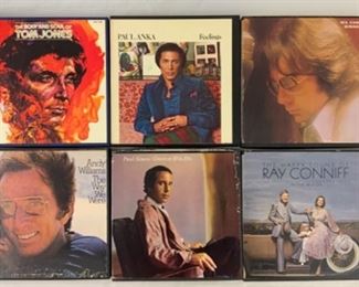 Multiple reel to reel tapes. Shown here: The body and soul of Tom Jones; Paul Lanka, feelings; Neil diamond, serenade; Andy Williams, the way we were; Paul Simon, greatest hits; The happy sound of Ray Conniff
