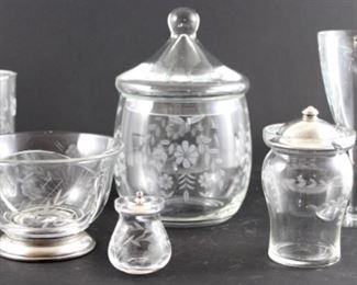Etched daisy pattern crystal biscuit jar with lid. Depression era etched wine stems set of eight with grapes. Antique etched crystal mustard jar. Vintage edge crystal jam jar with sterling lid. Edged cut crystal divided bowl on silver base. Set of six etched cut crystal daisy tumblers