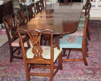 Another view:  Regency Mahogany 3 Pedestal 12’ Dinning Table with 12 Chippendale Chairs (10 Side Chairs & 2 Arm Chairs). Originally belonging to Herman & Margaret Brown