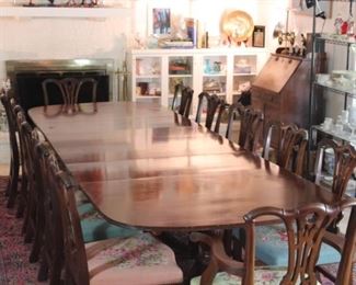 Regency Mahogany 3 Pedestal 12’ Dinning Table with 12 Chippendale Chairs (10 Side Chairs & 2 Arm Chairs). Originally belonging to Herman & Margaret Brown