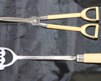Candlewick cutter and Admiral Grindall’s knife fork 1751 to 1820 British. Grindall lost his arm in action in 1795 during French revolution thus came the Knife fork. Silver with bone handle