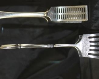 Back picture: Atkins brothers silver company 1853 to 1925 antique tongs. Front: Barker Brothers England antique electroplated nickel silver tongs Scissor Style.