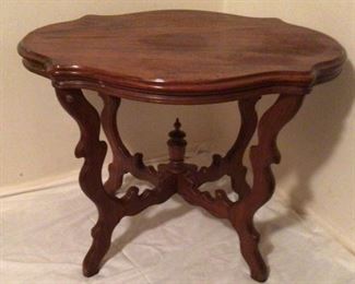 Antique 1890’s Victorian Turtle Back Parlor Table     (35”w x 27”D x 27”H)