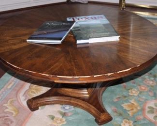Round Oak Coffee Table Raises to Dining Height, serving as an extra Dining Table