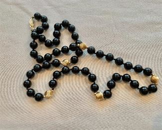 Onyx and gold beads with 14K clasp