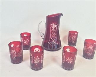Red Cut Glass Pitcher and Glasses.