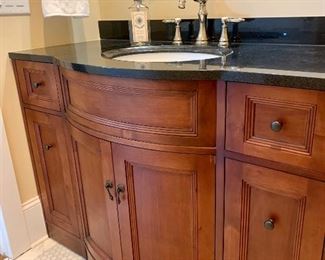 Bathroom vanity with black granite counter, porcelain sink & Moen faucet will be available for purchase and pick up later, 48” wide, 35” tall