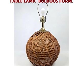 Lot 1233 Intricate Woven Rattan Table Lamp. Bulbous form. 