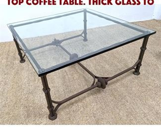 Lot 1240 Large Heavy Iron Glass Top Coffee Table. Thick glass to