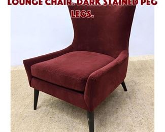 Lot 1374 Single Upholstered Lounge Chair. Dark stained peg legs.