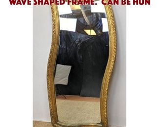 Lot 1392 Large Gold Gilt Mirror. Wave shaped frame. Can be hun