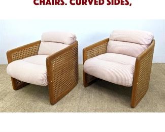 Lot 1433 Pair Cane Side Lounge Chairs. Curved sides,