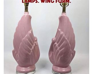 Lot 1594 Pr Pink glazed table lamps. Wing form.