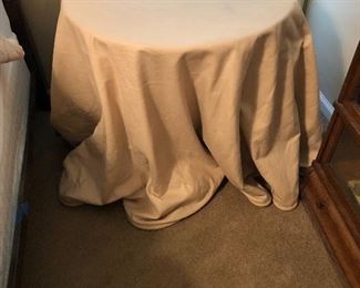 one of 3 skirted tables